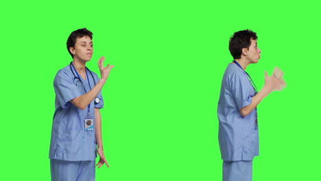 Displeased-irritated-nurse-shouting-no-and-arguing-with-someone-against-greenscreen